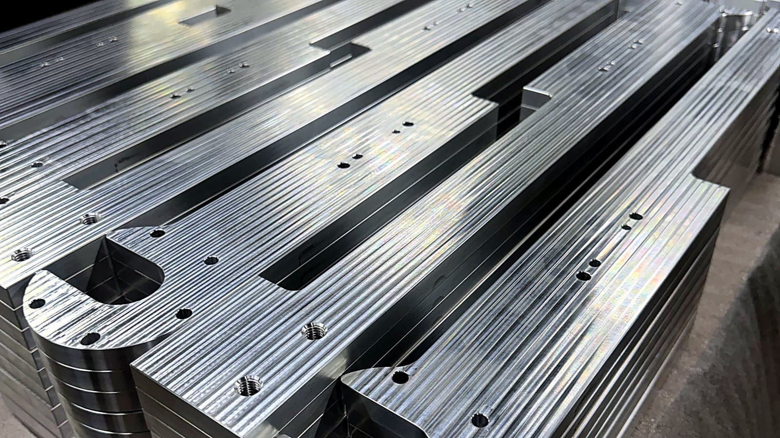 Precision-machined aluminum rails at RSA Manufacturing